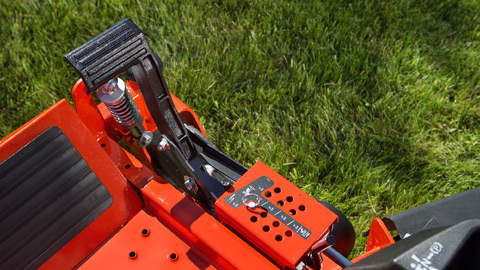 a red and black lawnmower