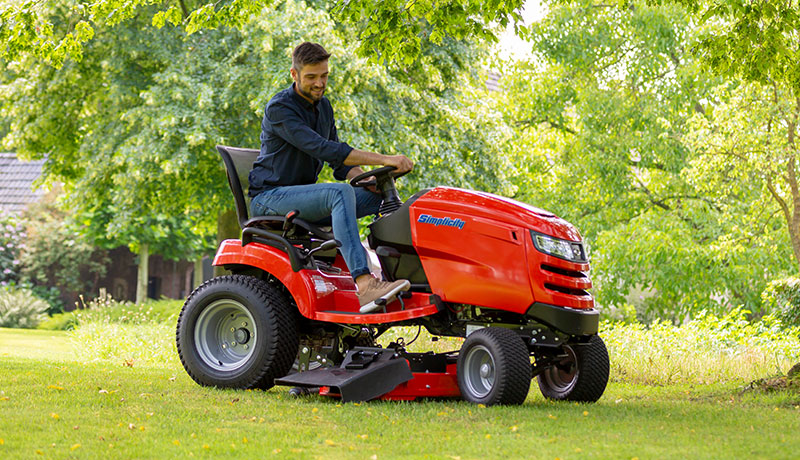Man mowing on Simplicity Broadmoor lawn tractor 