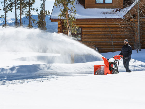 Man blowing snow with Simplicity snow blower