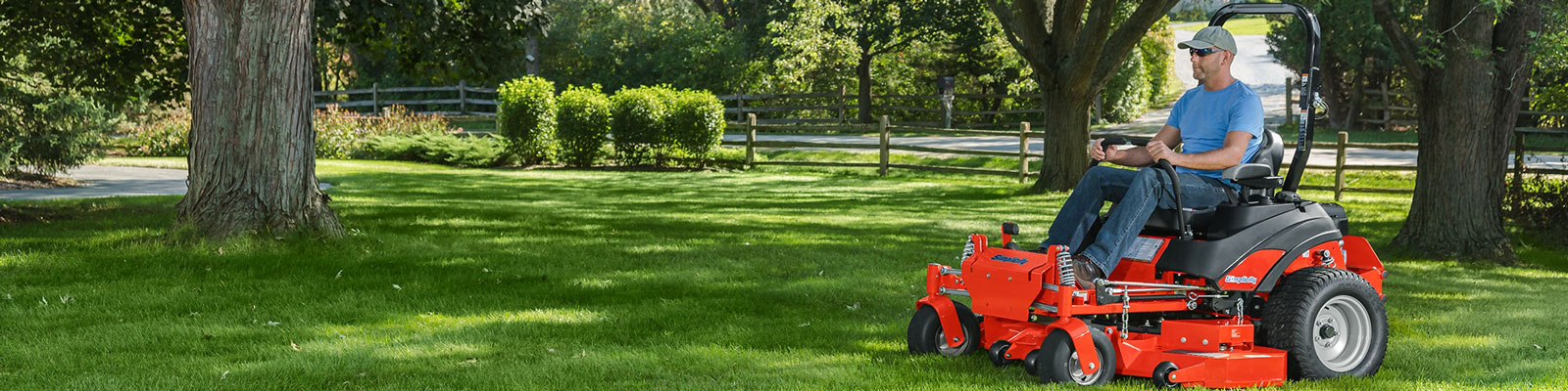 Man mowing lawn with Simplicity zero turn mower